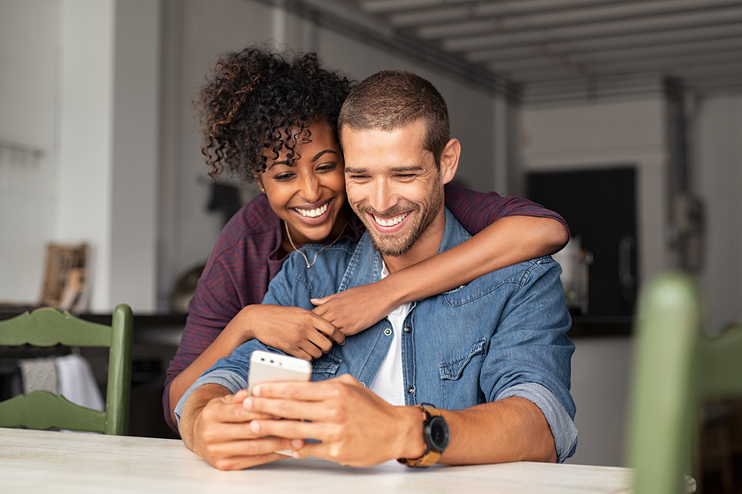 Happy couple reviewing results